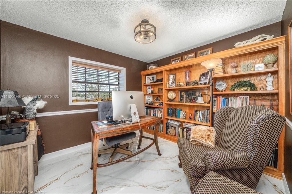 479 E Street Zolfo Springs, FL 33890 - Photo 35 of 50 a workspace with furniture and a window