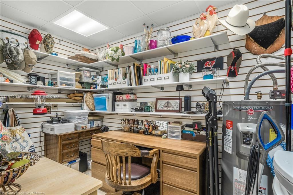 479 E Street Zolfo Springs, FL 33890 - Photo 37 of 50 a utility room with stainless steel appliances and cabinets