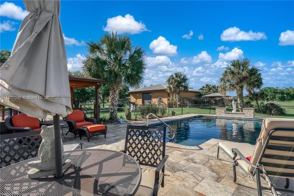 479 E Street Zolfo Springs, FL 33890 - Photo 47 of 50 a view of a chairs and table in patio