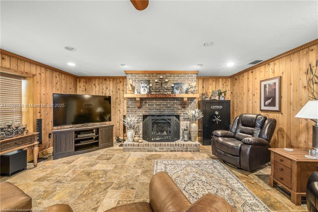 479 E Street Zolfo Springs, FL 33890 - Photo 6 of 50 a living room with furniture and a flat screen tv