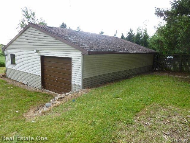 5913 Mason Road Fowlerville, MI 48836 - Photo 4 of 25 GARAGE BACK SIDE VIEW