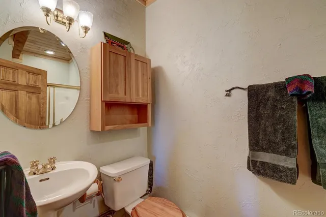 a view of a lush green hillside and a houses