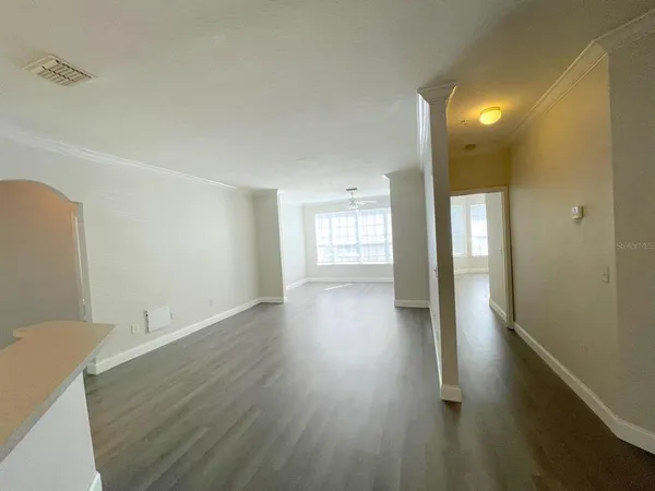 a view of entryway with wooden floor