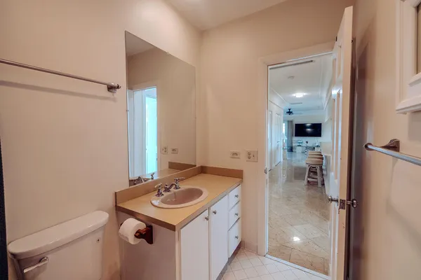 a kitchen with a sink stove and refrigerator