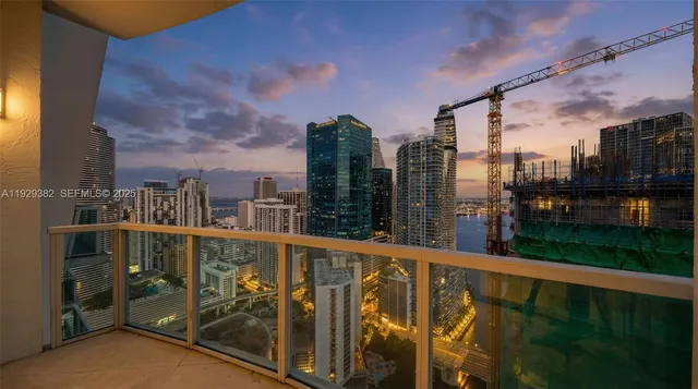 a view of a balcony with city view