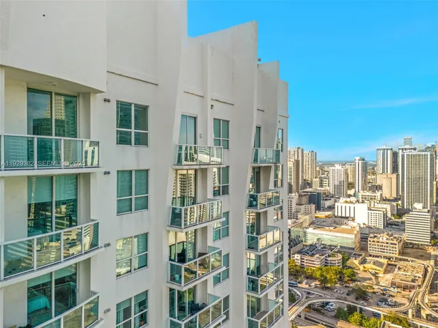a view of city with tall buildings