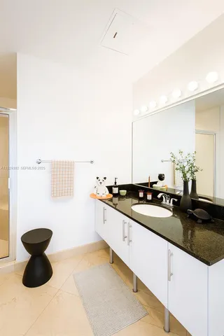 a kitchen with a sink and a stove