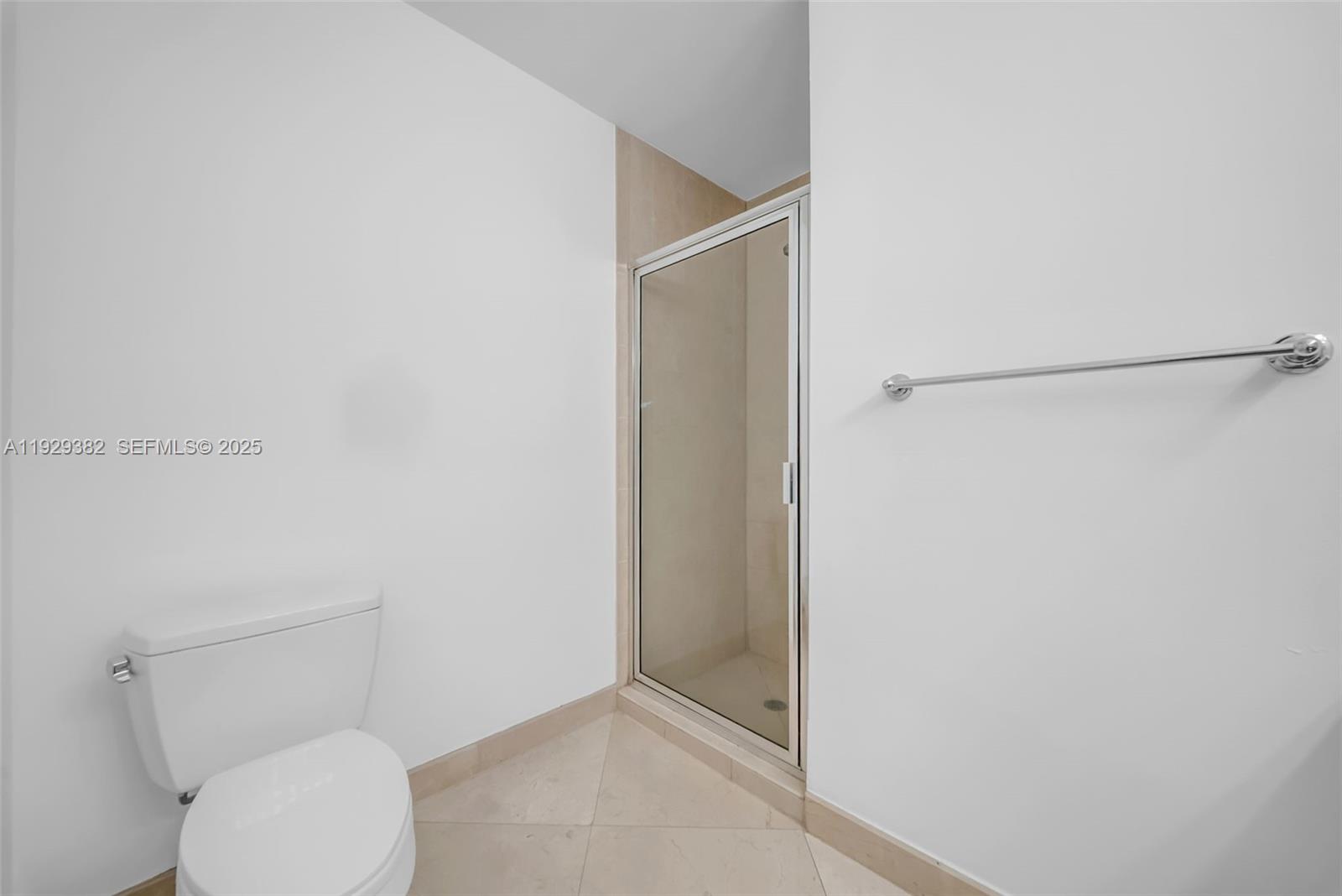 31 Southeast 5th Street, Unit 4314 Miami, FL 33131 - Photo 23 of 40 a bathroom with a toilet and a shower