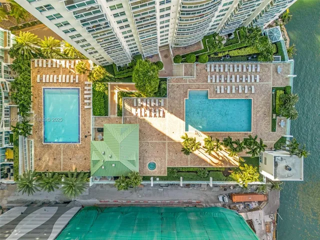 a view of a large building with a lake view