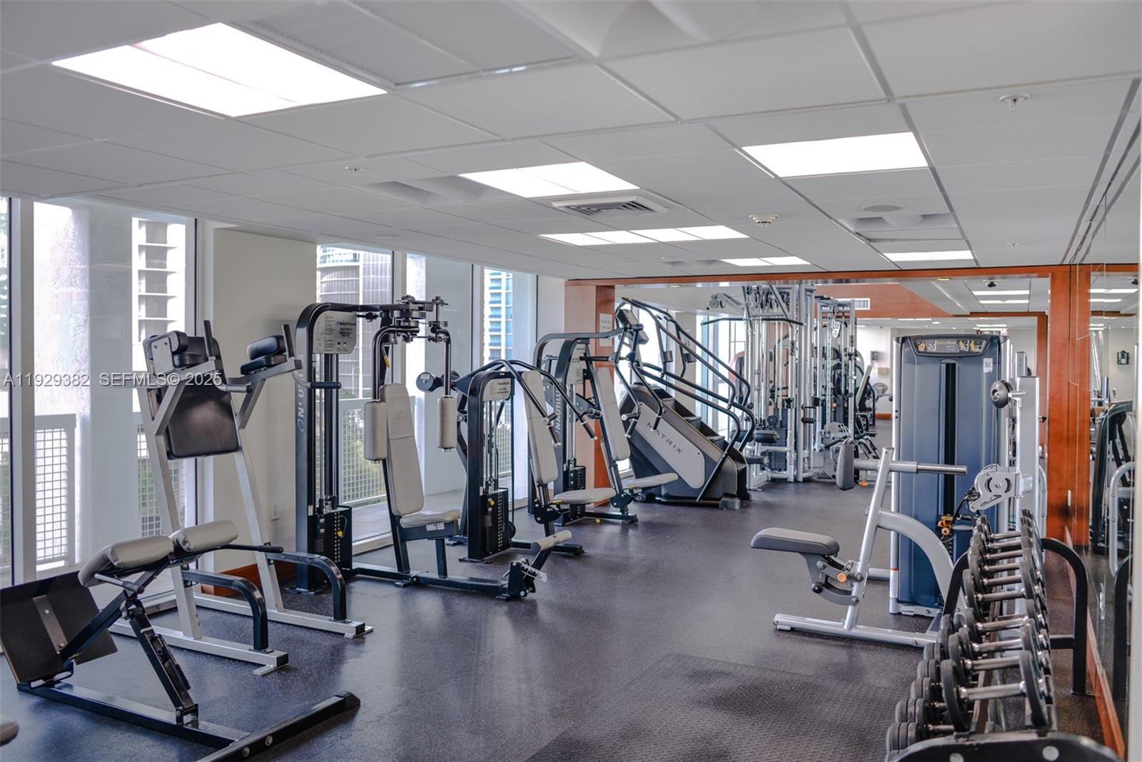 31 Southeast 5th Street, Unit 4314 Miami, FL 33131 - Photo 32 of 40 a view of a room with gym equipment