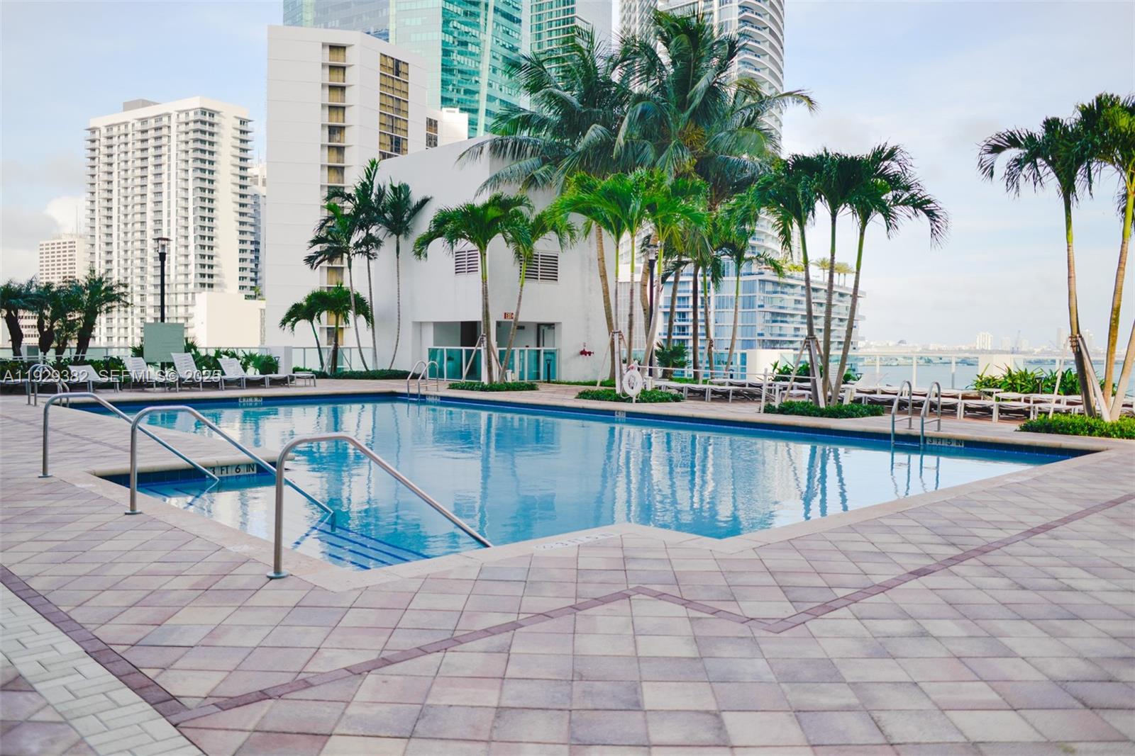 31 Southeast 5th Street, Unit 4314 Miami, FL 33131 - Photo 36 of 40 a view of swimming pool with outdoor seating