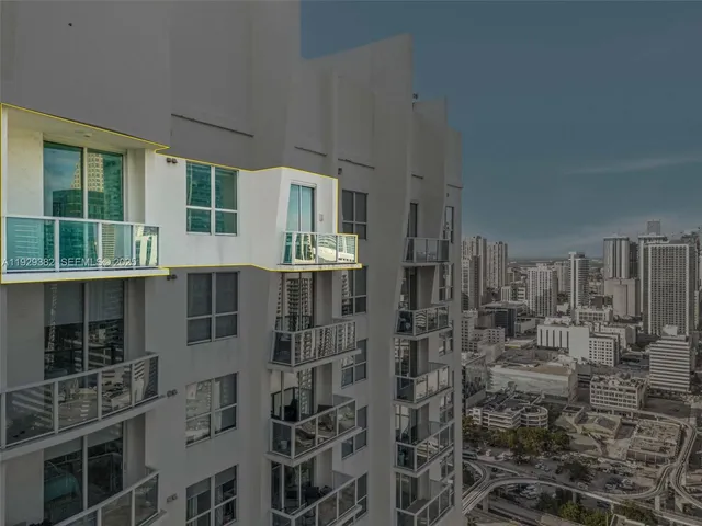 a view of residential house with parking space