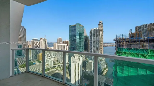 a view of a balcony with city view