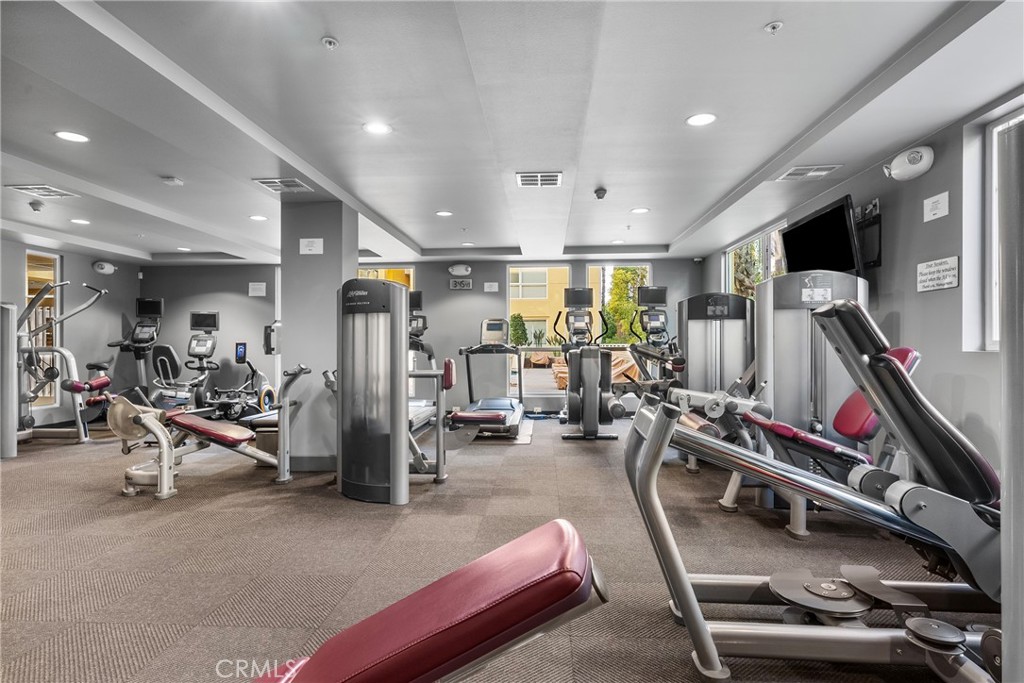 21301 Erwin Street, Unit 206 Woodland Hills, CA 91367 - Photo 21 of 34 a view of a room with gym equipment