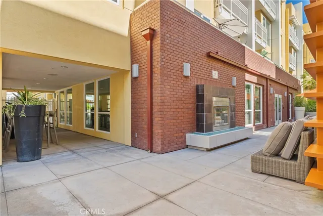 a view of a backyard with sitting area