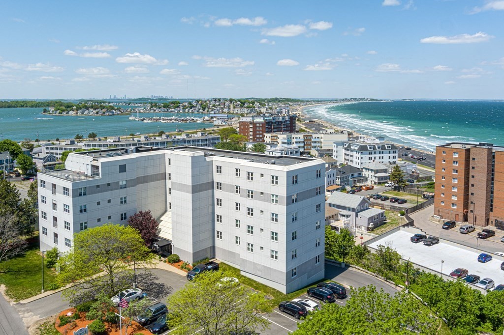 20 Rockland House Road, Unit 402 Hull, MA 02045 - Photo 1 of 40 an aerial view of a city with lots of residential buildings