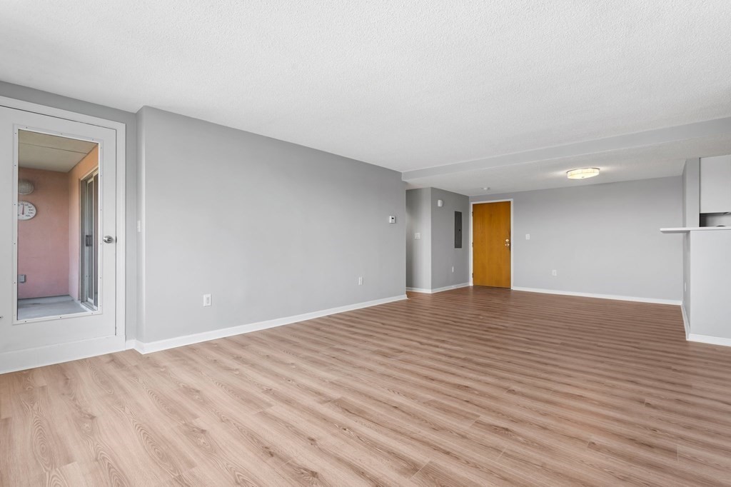 20 Rockland House Road, Unit 402 Hull, MA 02045 - Photo 7 of 40 a view of empty room with wooden floor