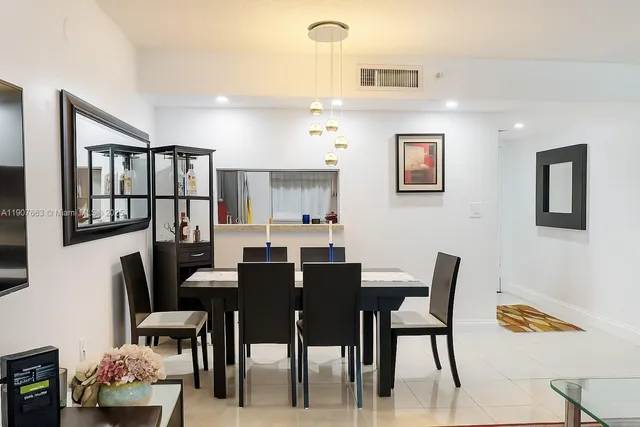 a view of a dining room with furniture