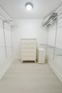 a view of an empty walk in closet