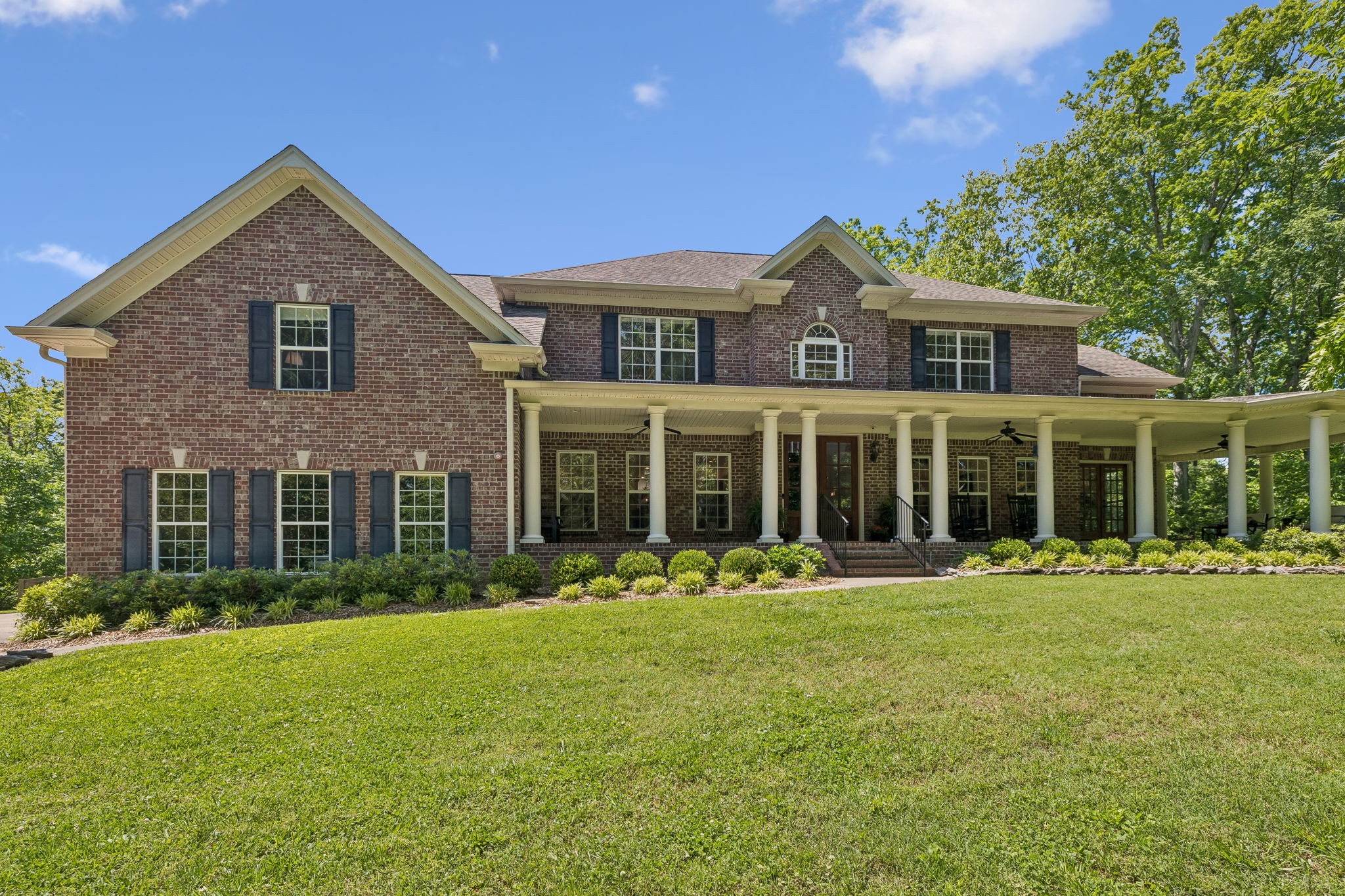911 Bluff Road Brentwood, TN 37027 - Photo 1 of 61 a front view of a house with a yard
