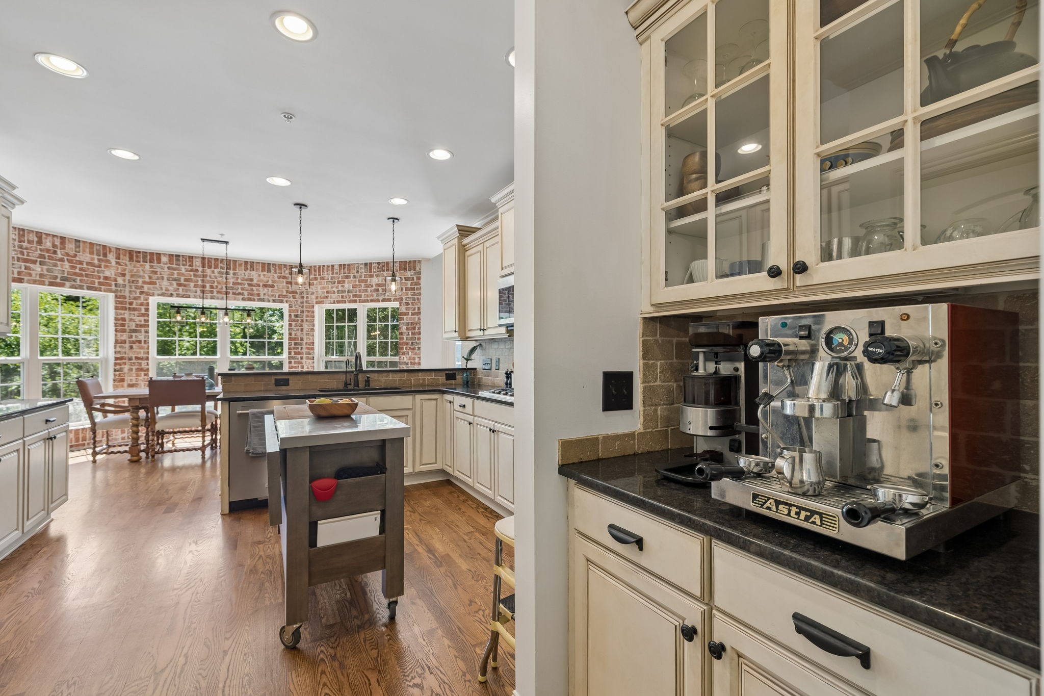 911 Bluff Road Brentwood, TN 37027 - Photo 12 of 61 a kitchen with counter top space and wooden floor