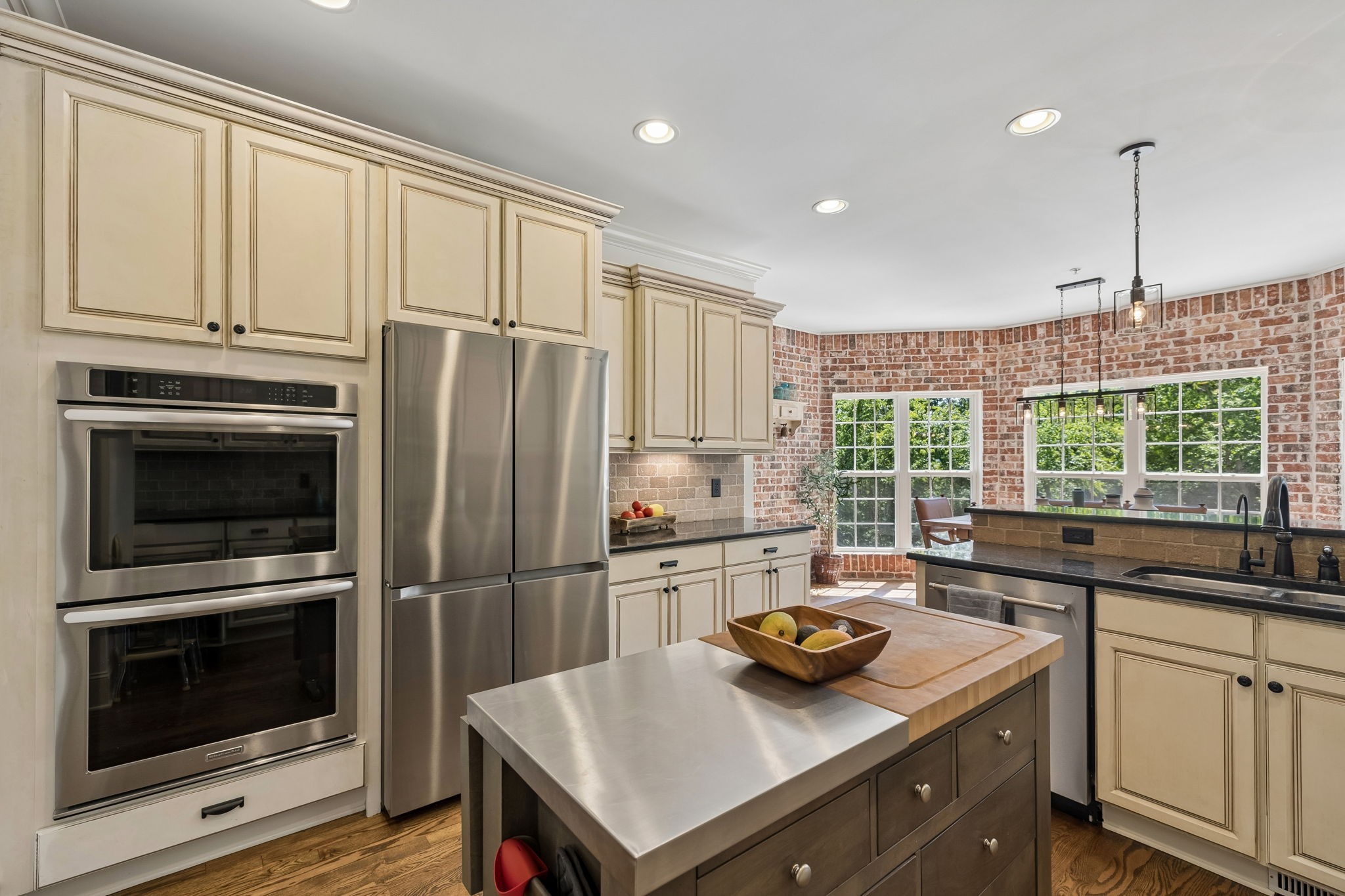 911 Bluff Road Brentwood, TN 37027 - Photo 14 of 61 a kitchen with a stove a sink and a refrigerator