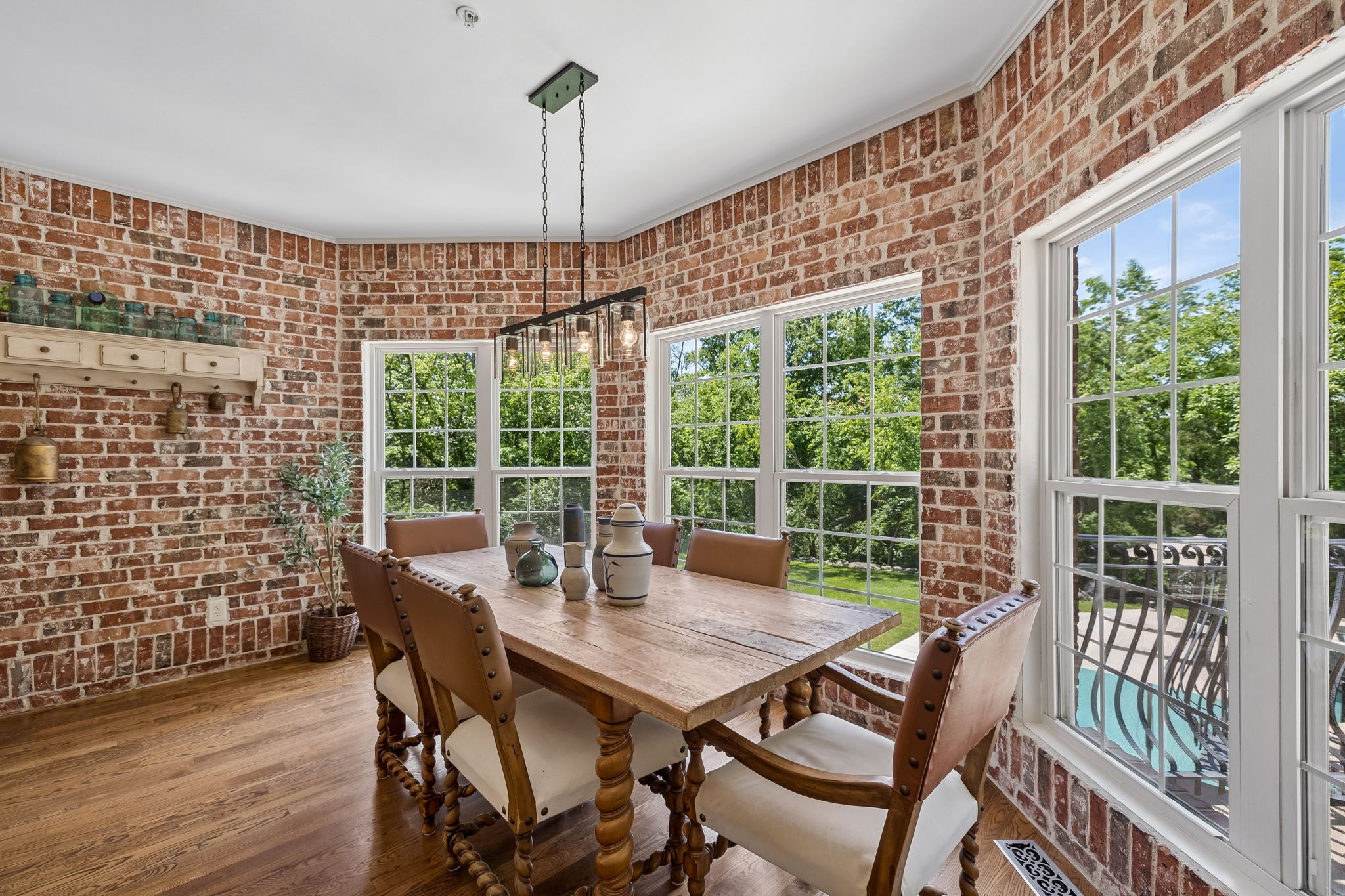911 Bluff Road Brentwood, TN 37027 - Photo 17 of 61 a view of a dining room with furniture window and wooden floor