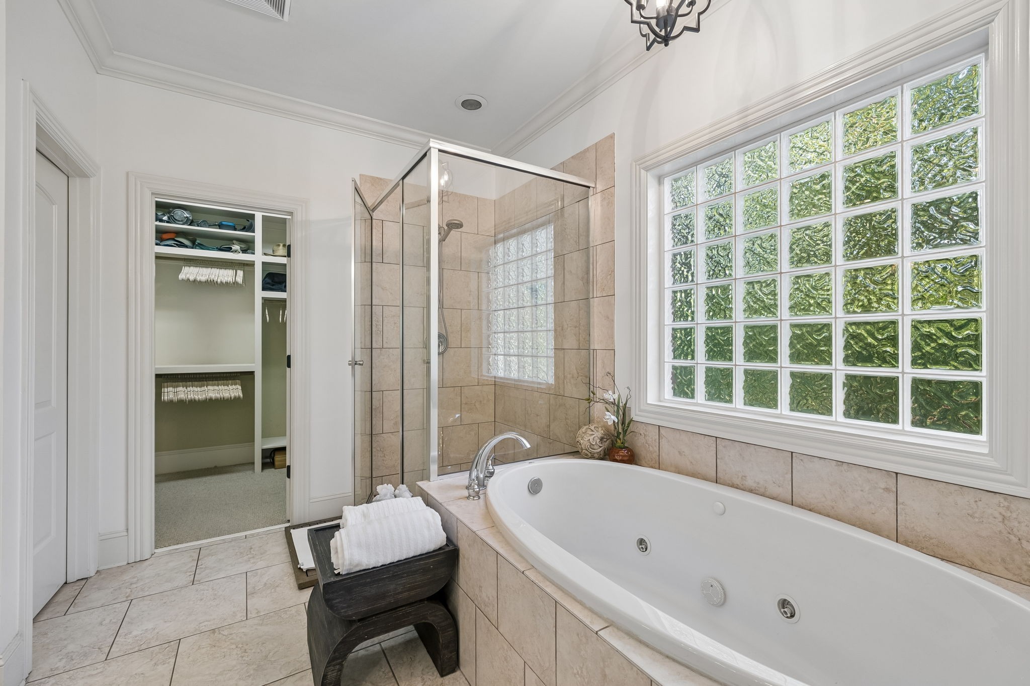 911 Bluff Road Brentwood, TN 37027 - Photo 20 of 61 a bathroom with a tub sink and shower