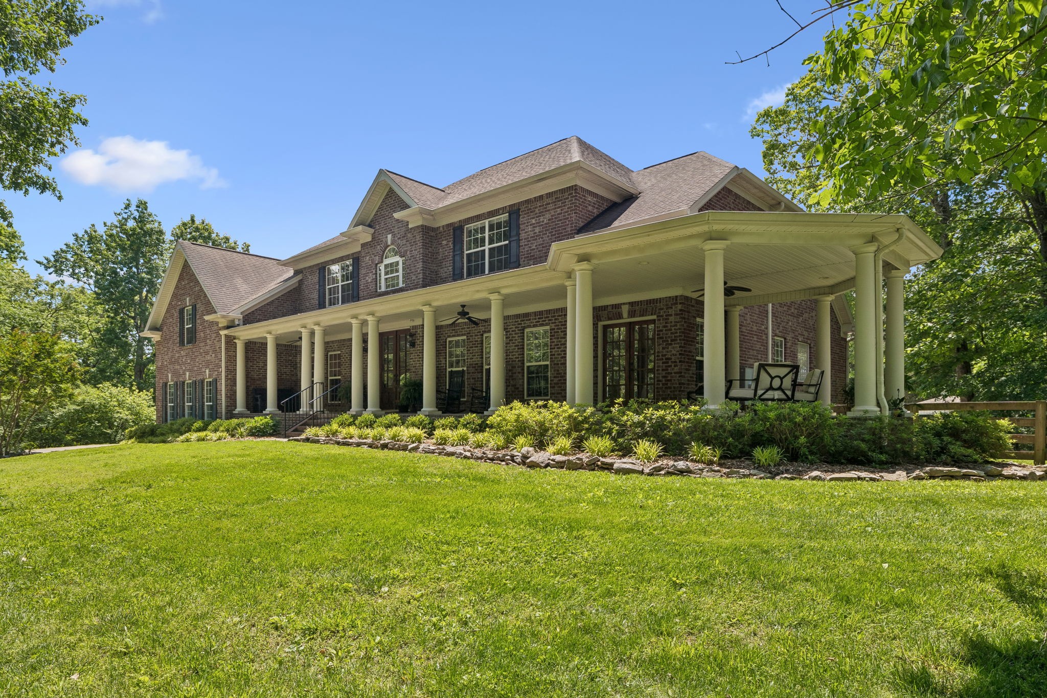 911 Bluff Road Brentwood, TN 37027 - Photo 2 of 61 a front view of a house with a yard