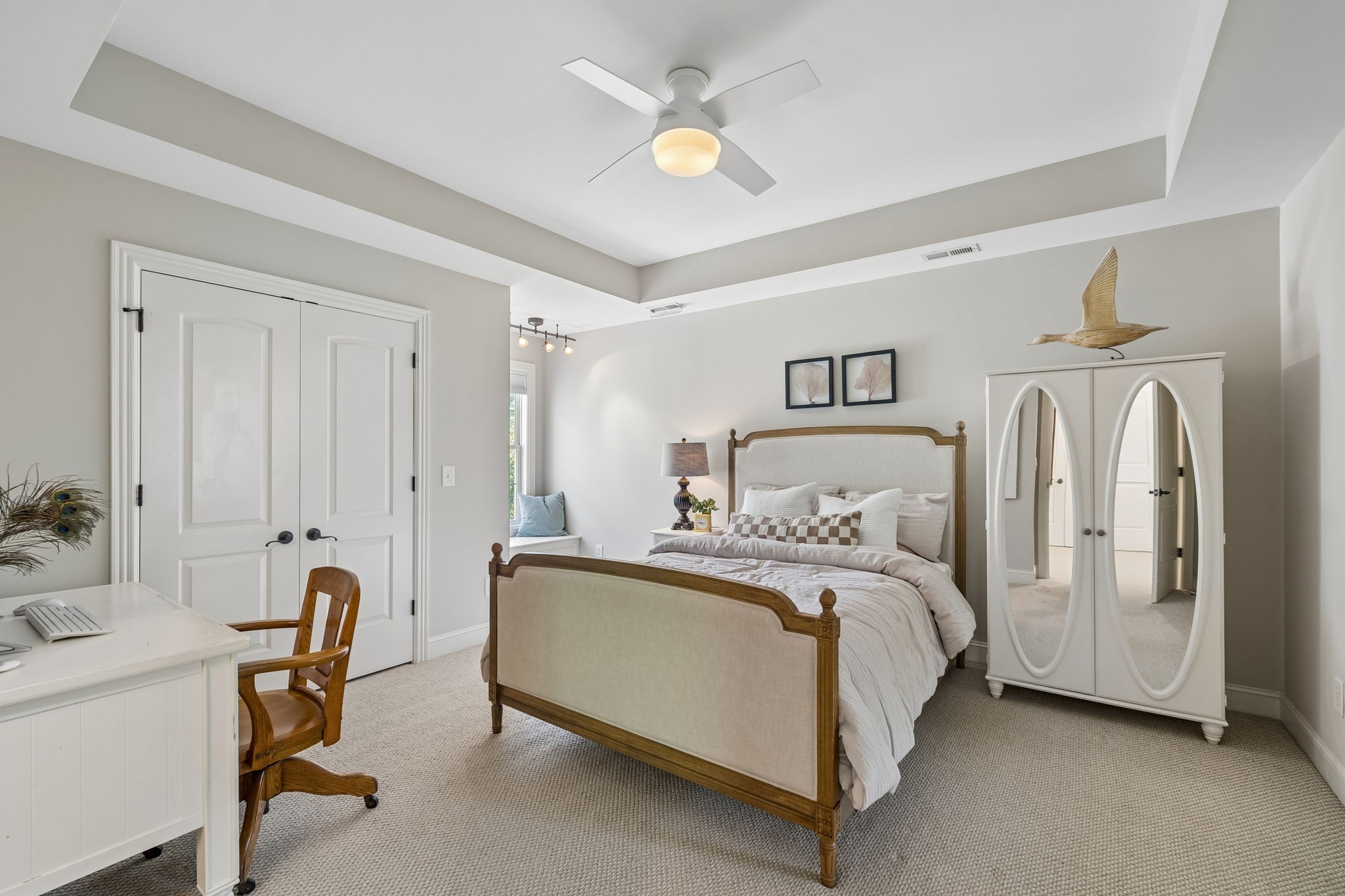 911 Bluff Road Brentwood, TN 37027 - Photo 26 of 61 a bedroom with a bed and a chandelier