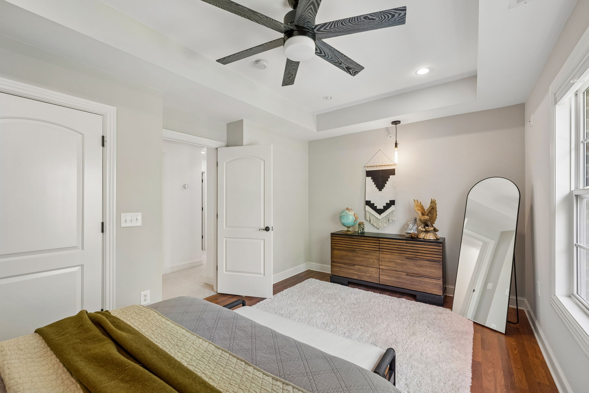 911 Bluff Road Brentwood, TN 37027 - Photo 28 of 61 a bedroom with a bed and wooden floor