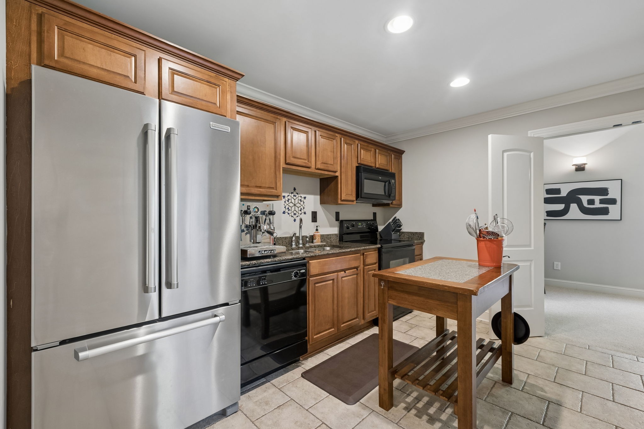 911 Bluff Road Brentwood, TN 37027 - Photo 29 of 61 a kitchen with stainless steel appliances granite countertop a refrigerator and a stove top oven