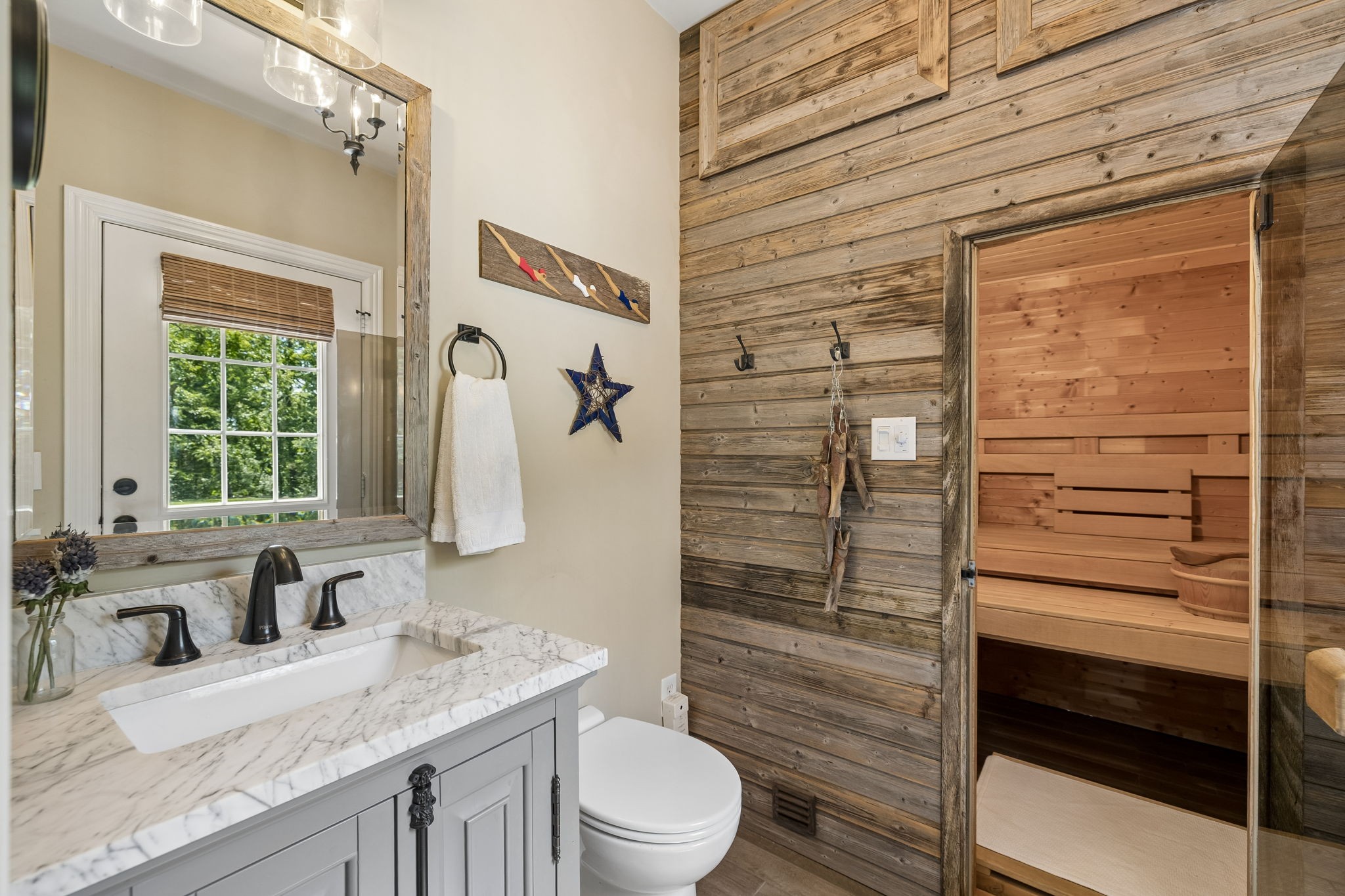 911 Bluff Road Brentwood, TN 37027 - Photo 35 of 61 a bathroom with a granite countertop sink toilet and shower