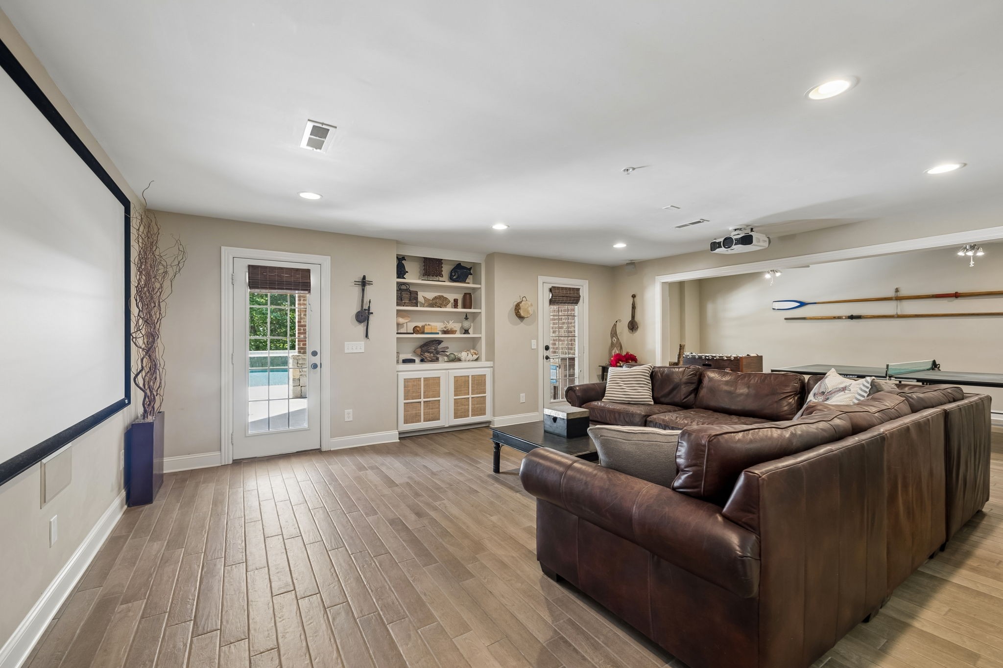 911 Bluff Road Brentwood, TN 37027 - Photo 38 of 61 a living room with furniture and a wooden floor