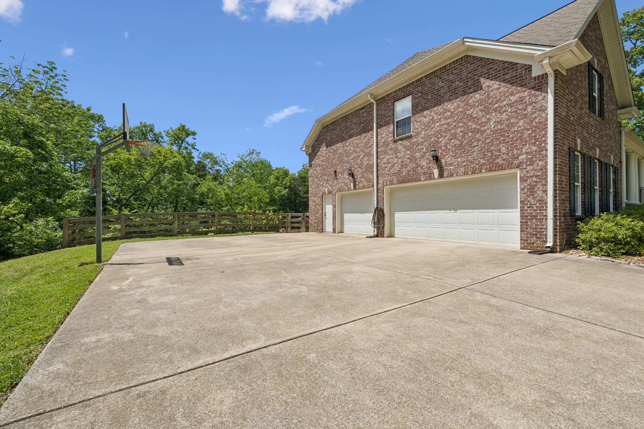 911 Bluff Road Brentwood, TN 37027 - Photo 46 of 61 a front view of a house with a yard and trees