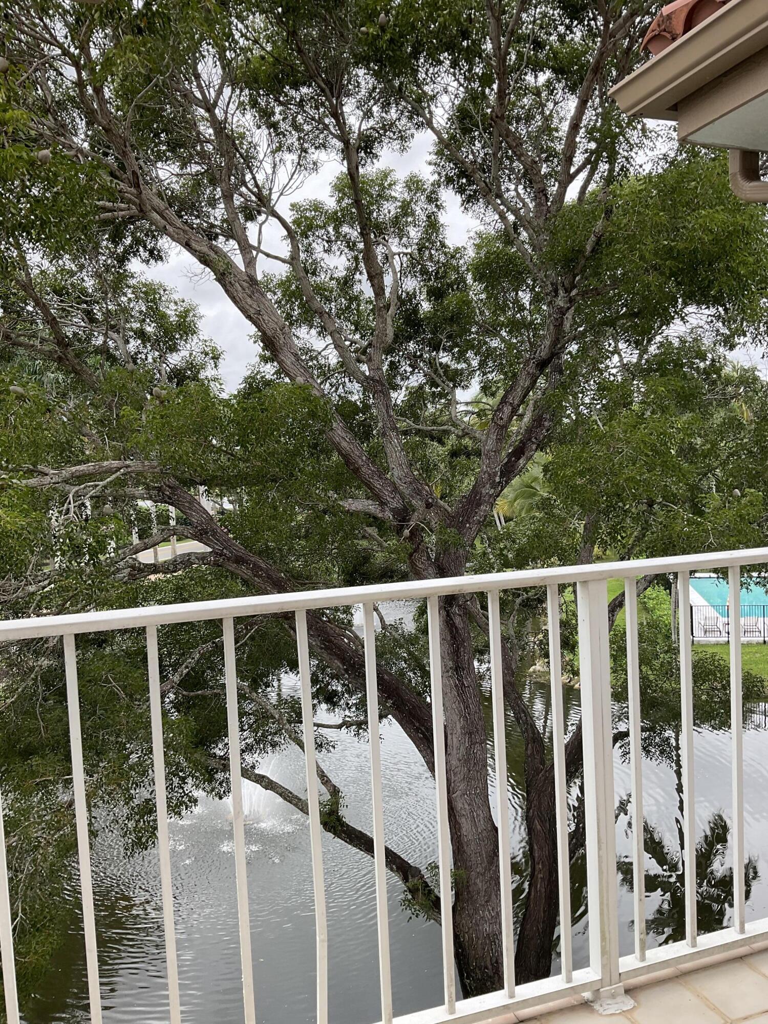 7370 Orangewood Lane, Unit 303 Boca Raton, FL 33433 - Photo 28 of 45 a view of a deck