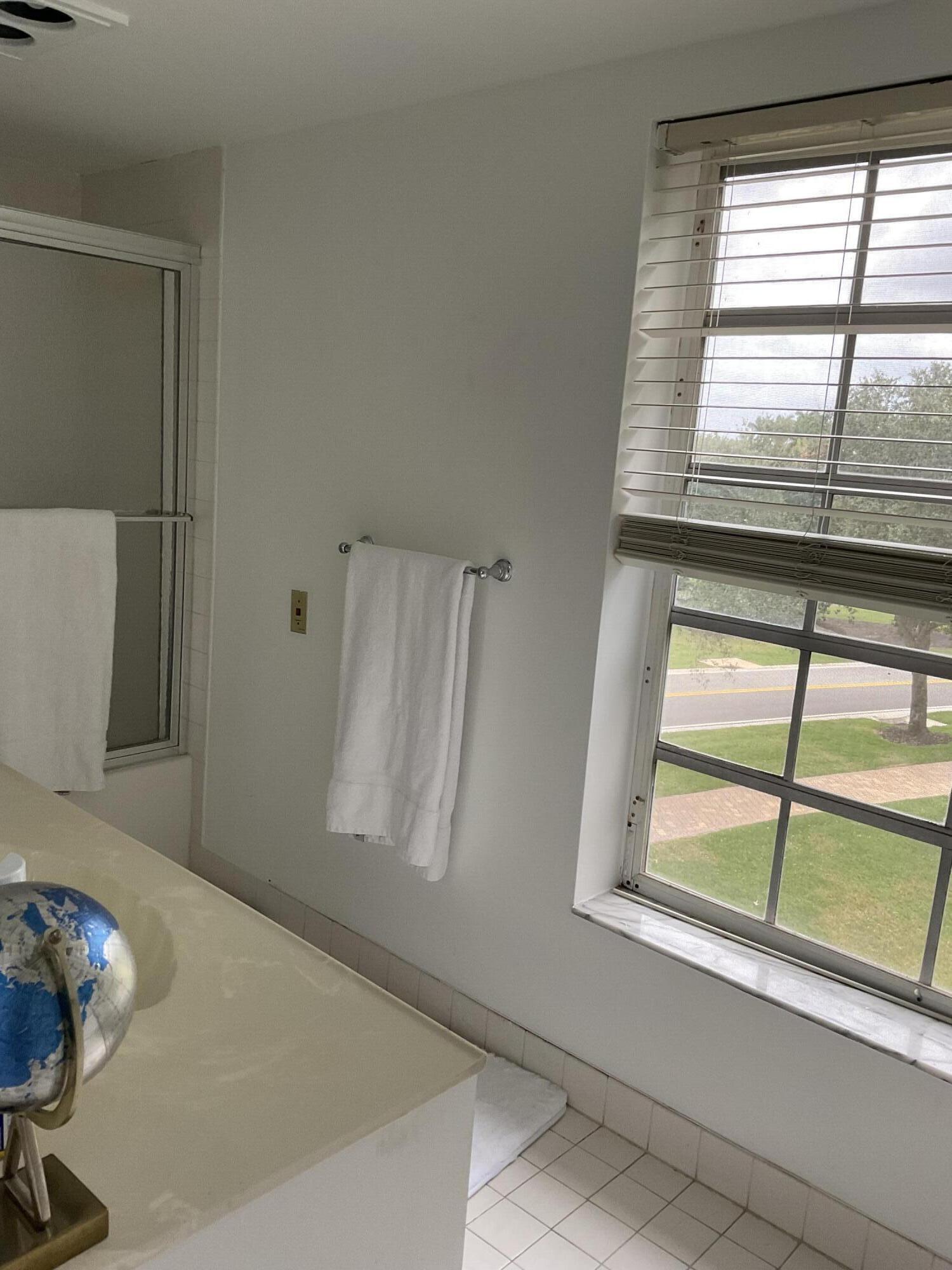 7370 Orangewood Lane, Unit 303 Boca Raton, FL 33433 - Photo 31 of 45 a view of rack on the floor