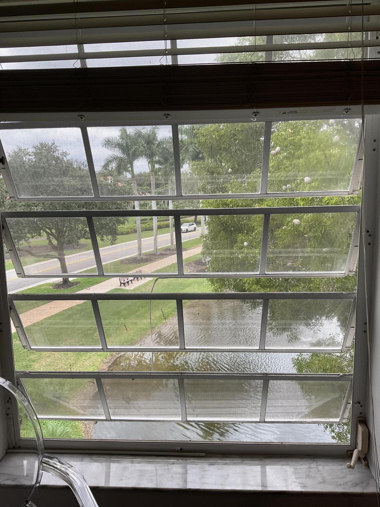 7370 Orangewood Lane, Unit 303 Boca Raton, FL 33433 - Photo 34 of 45 a view of window in a room
