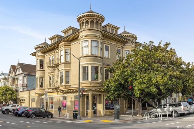 a front view of a building with a street