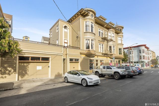 a car parked in front of a building
