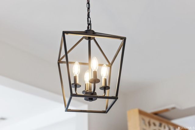 a close view of light fixtures and entryway