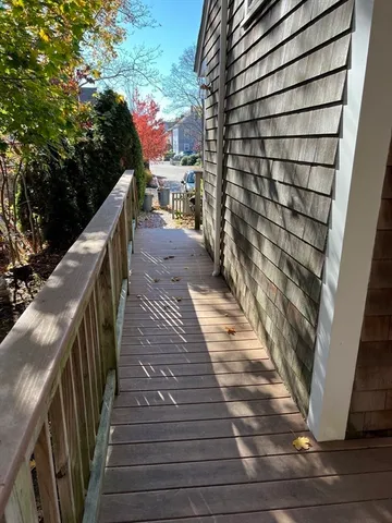 a kitchen with stainless steel appliances granite countertop a sink a stove and a microwave