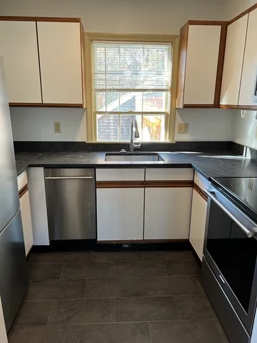 a view of staircase with white walls and white walls