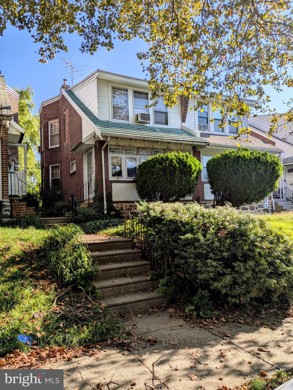 817 Passmore Street Philadelphia, PA 19111 - Photo 1 of 16 a front view of a house with a yard
