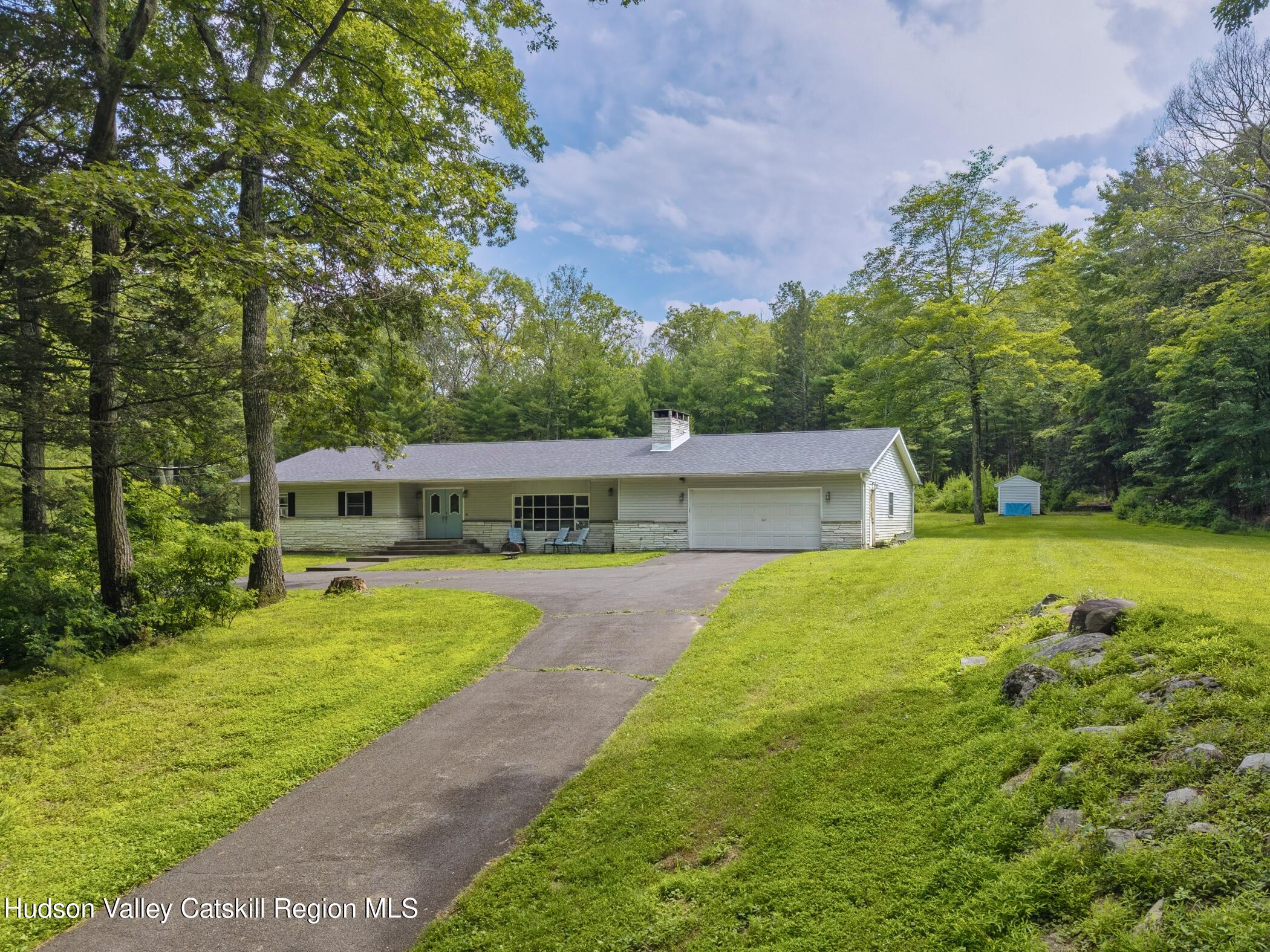 137 Bush Road Stone Ridge, NY 12484 - Photo 2 of 39 a view of a house with a garden
