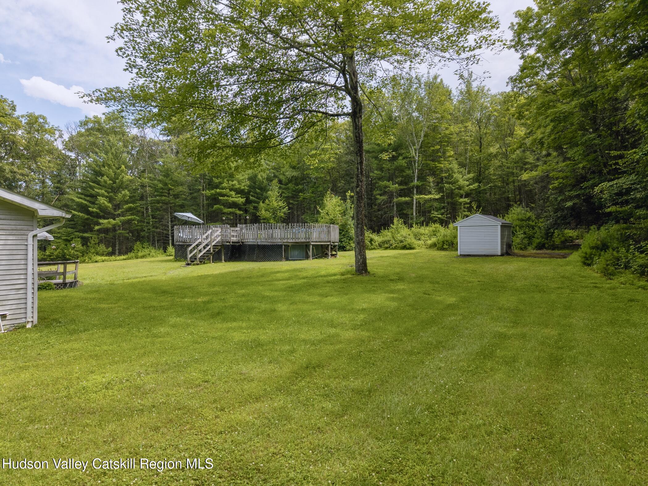 137 Bush Road Stone Ridge, NY 12484 - Photo 33 of 39 a view of a garden with a slide