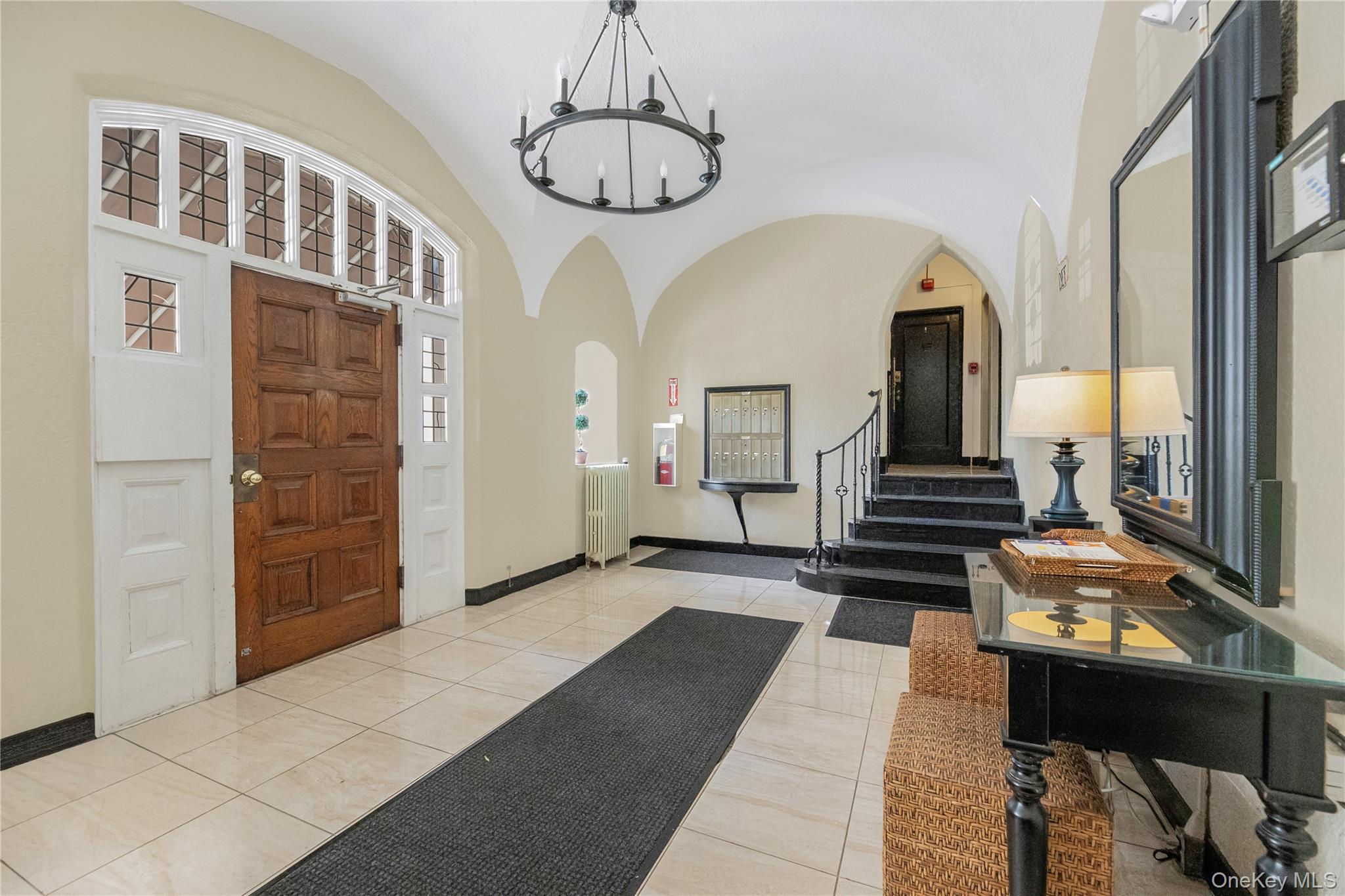26 Pondfield Road, Unit 1D Bronxville, NY 10708 - Photo 4 of 21 a view of entryway with stairs and furniture