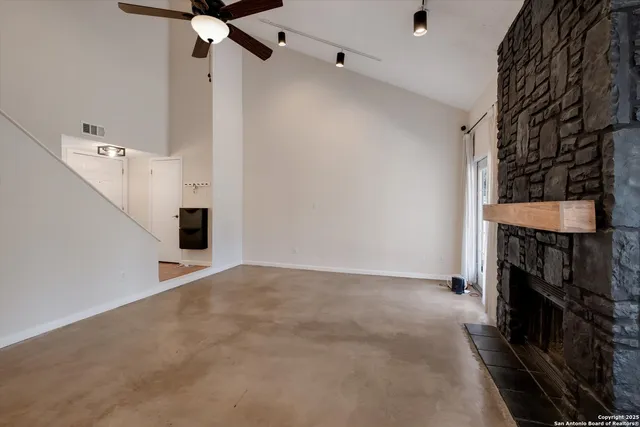 an entryway with an empty room