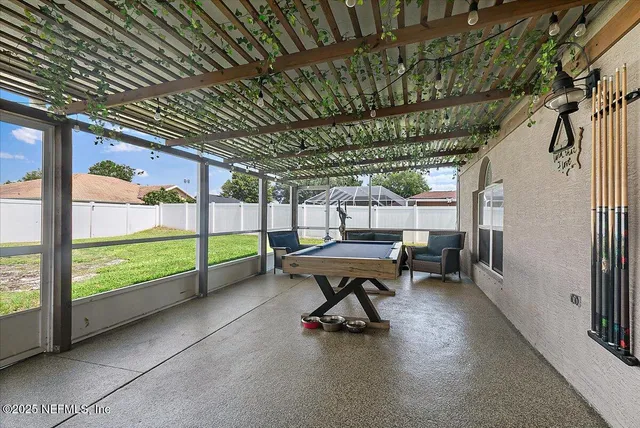 a view of swimming pool with a yard