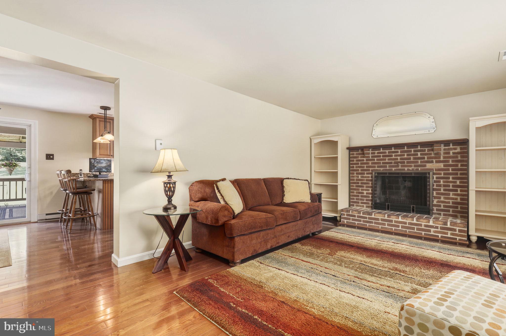 6336 Boyers Mill Road New Market, MD 21774 - Photo 14 of 49 a living room with furniture and a fireplace